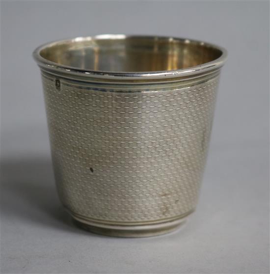 A French Cartier engine turned silver small beaker, 1.9 oz.